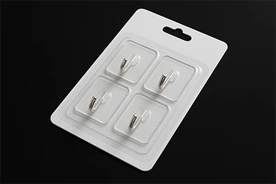 blister pack of adhesive wall hooks - 1